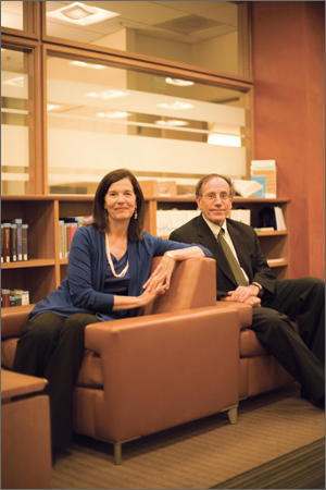 Photo of Petersilia and Weisberg, seated in Robert Crown Law Library.