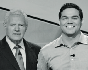 Photo of Jesse Cuevas with Alex Trebek as a contestant on Jeopardy!