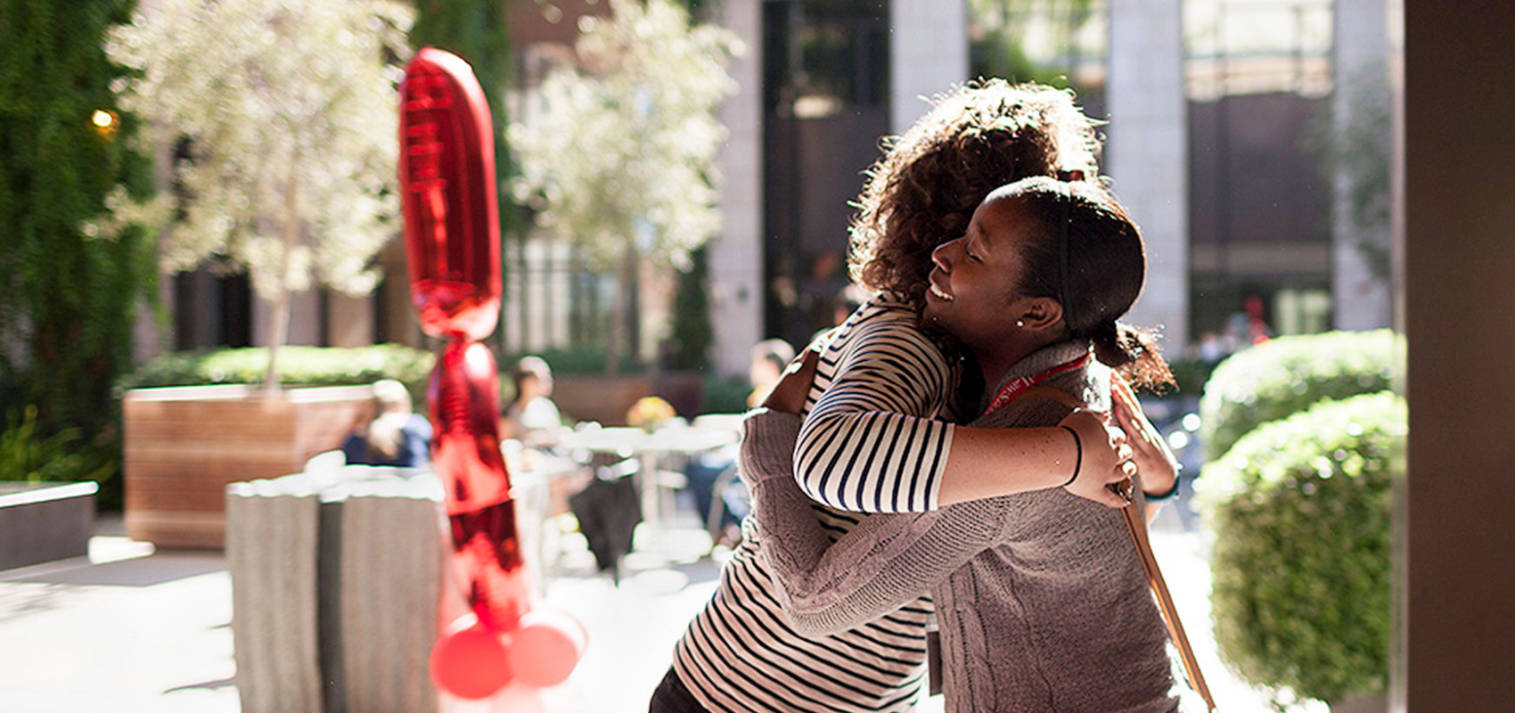 Reunion: Lifelong Friends, Stanford Memories. Alumni hugging.
