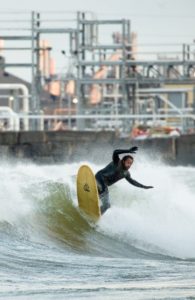 Photo of David B. Owens surfing
