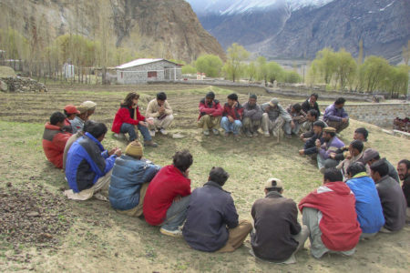 Aisha Khan meets with community leaders in Askole village in 2003. The village is on the access routes to Baltoro, Biafo and Hisper glaciers in the lofty Karakorum range of Pakistan. (Image credit: Mohammad Hussain)