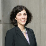 Danielle Hirsch, smiling, in a black blazer