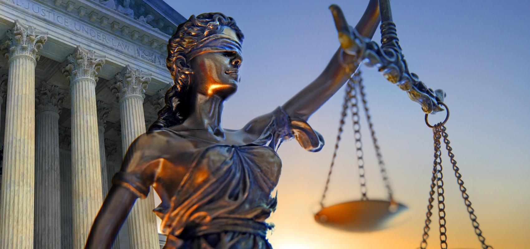 Statue - Justice, Supreme Court in background.