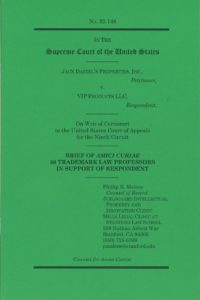 Color photo of the cover of a printed copy of the Clinic’s amicus brief. The cover is dark green and includes the name and caption of the case printed in black.
