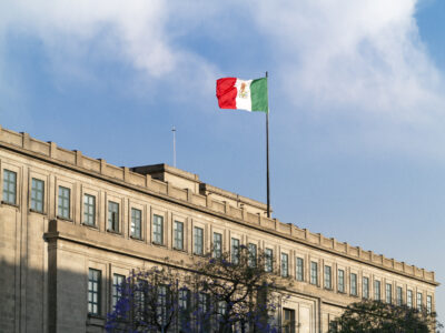 "The Supreme Court of Mexico (Suprema Corte de la Justicia de la Nacion) with the Mexican flag on the roof. Mexico City, Mexico."