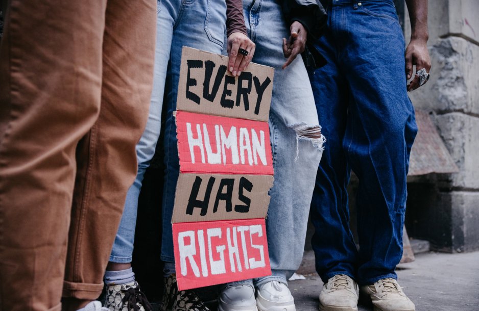 Group of people marching for human rights in New York City.