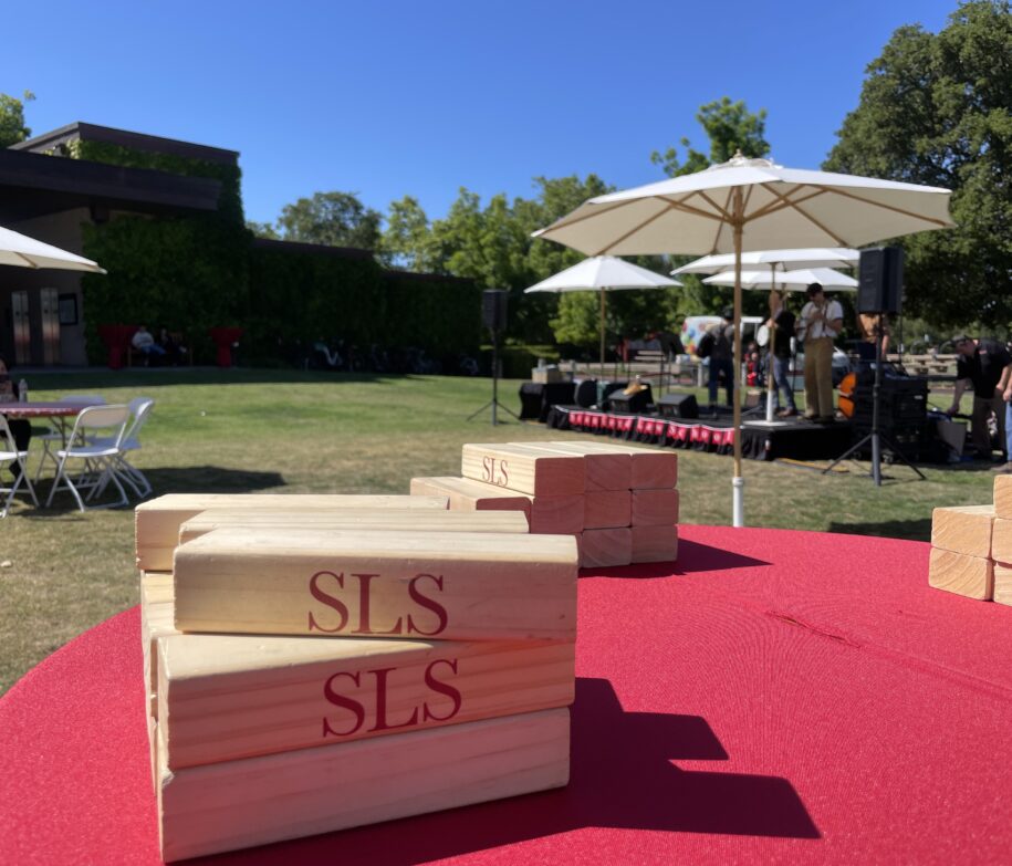 SLS Social BBQ: Jenga blocks with SLS marked on them, stacked.