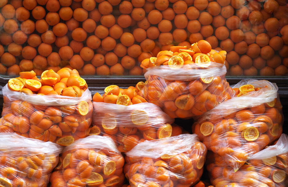 Upcycling Food Materials - large bags of orange peels left over from making orange juice.