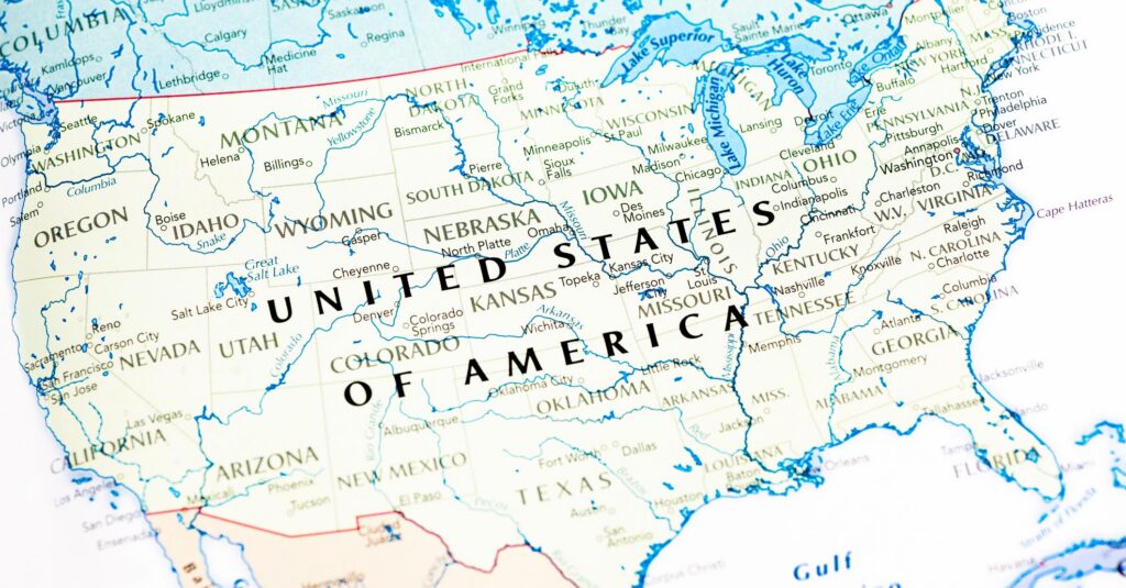 Photo map of USA. Shallow depth of field, focus on the United State of America word of the map and the area nears it.