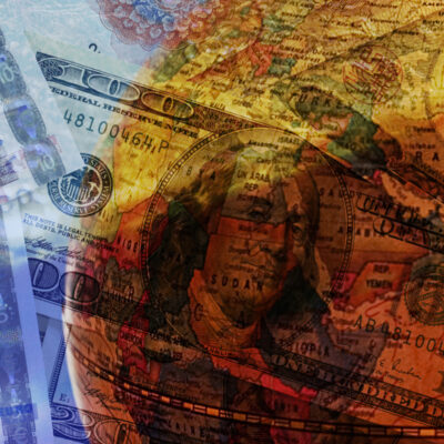 Image of a globe overlayed with currency from different countries.
