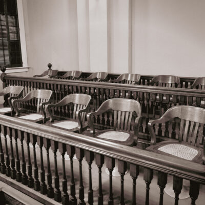 Photo of a jury section in a courtroom.