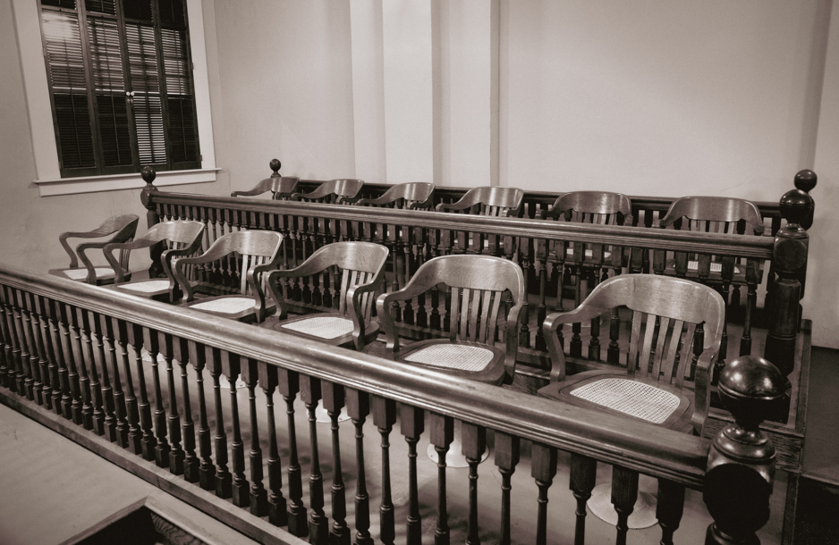 Photo of a jury section in a courtroom.